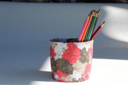 red with white and black pencil box